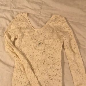 Lace long sleeved shirt.